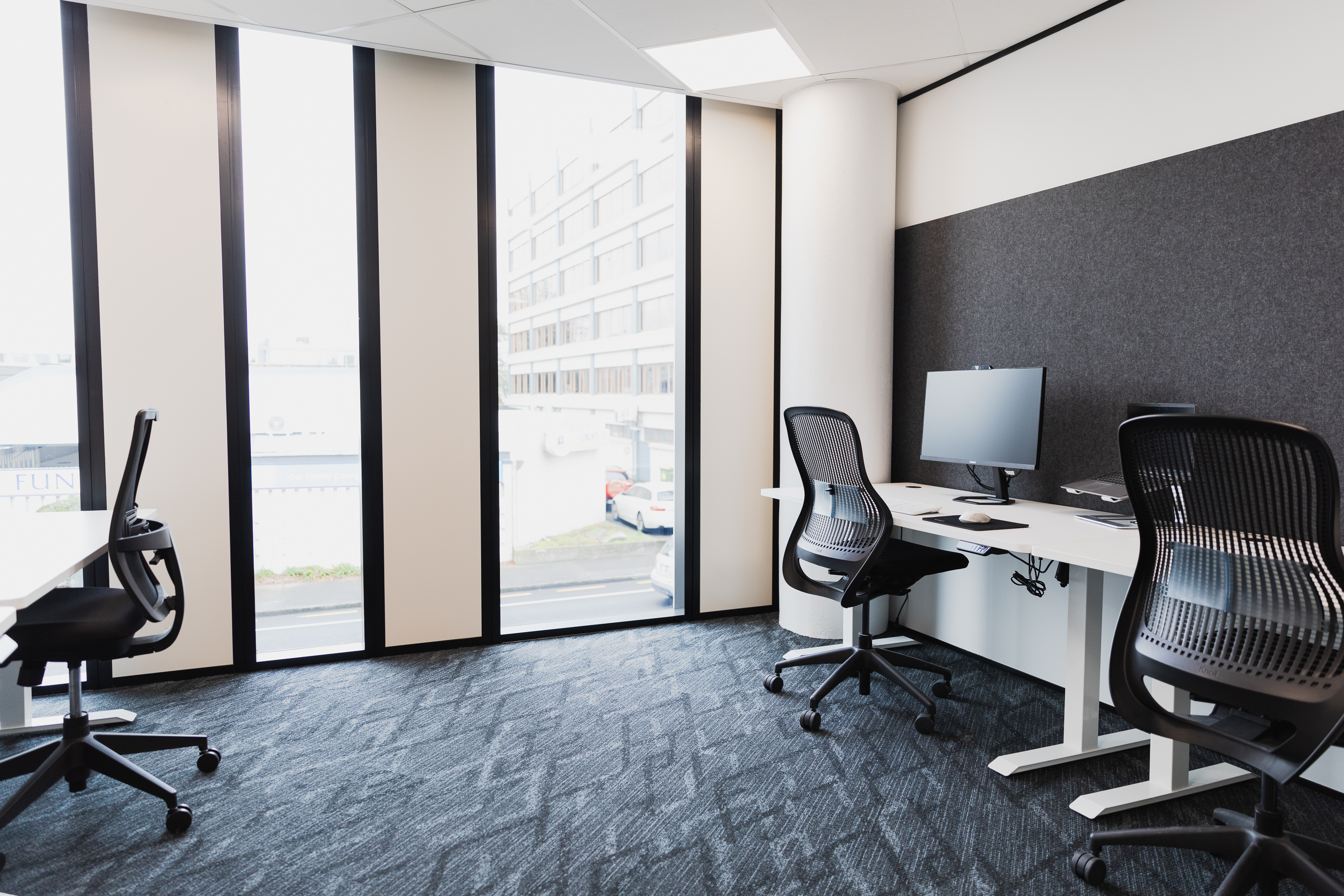 Private office with dedicated desks at Q Space